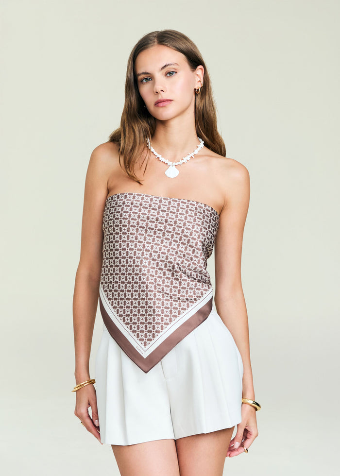 Hark Satin Top worn strapless with a brown geometric bandeau by a model