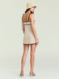 Malkie Crochet Mini Dress worn with straw hat on model beige crochet dress with dark trim thumbnail image 4 of 5