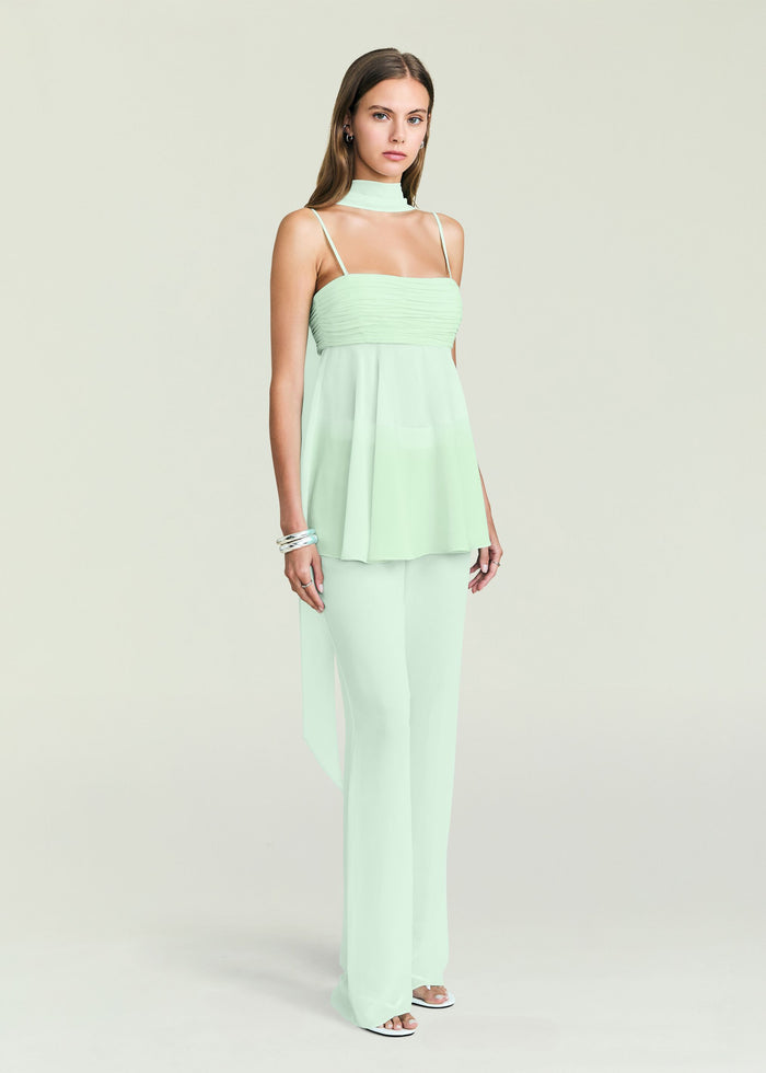Mint green Tamara Top with ruched bust and thin straps against pale backdrop.