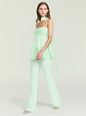 Model wearing the Mave Pant set in mint green with ruched top and flowing wide leg pants. thumbnail image 2 of 5