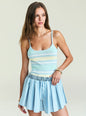 Model wearing a pastel striped knit tank top with a matching striped skirt. thumbnail image 1 of 5