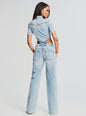 Back view of Karen Jumpsuit in light denim with waist cutouts thumbnail image 4 of 5