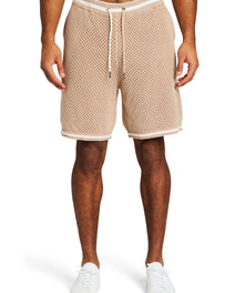 Beige crochet shorts with a white drawstring worn by a man.