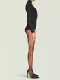 Side view of Rei Knit Romper in black ribbed knit with a high neck and fitted silhouette thumbnail image 3 of 5