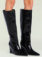 Two black crocodile-embossed knee-high boots with glossy finish and chunky heels. thumbnail image 5 of 5