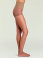 Profile view of a model wearing Highlighter Sheer Tights in beige with a high waist thumbnail image 1 of 1