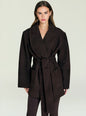Model in a dark brown suede wrap jacket with wide lapels and a tied belt. thumbnail image 1 of 5