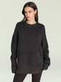 May Sweater worn by a woman in a dark fuzzy knit against a pale background. thumbnail image 1 of 5