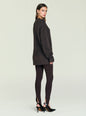 Full body shot of a model in the May Sweater paired with dark leggings and black heels. thumbnail image 4 of 5