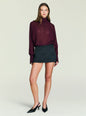 Front view of the Usha Wool Skirt worn with a burgundy blouse. thumbnail image 2 of 5
