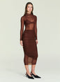 Thessa Ruched Skirt shown with a sheer brown top on a model. thumbnail image 3 of 5