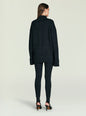Back view of a model in a dark grey knit sweater with matching pants. thumbnail image 4 of 5