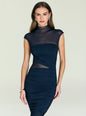 Front view of a model wearing navy Tabitha Mesh Ruched Midi Dress with sheer mesh yoke across the shoulders. thumbnail image 5 of 5