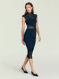 Navy Tabitha Mesh Ruched Midi Dress on a model with sheer mesh neckline and ruching bodice thumbnail image 1 of 5