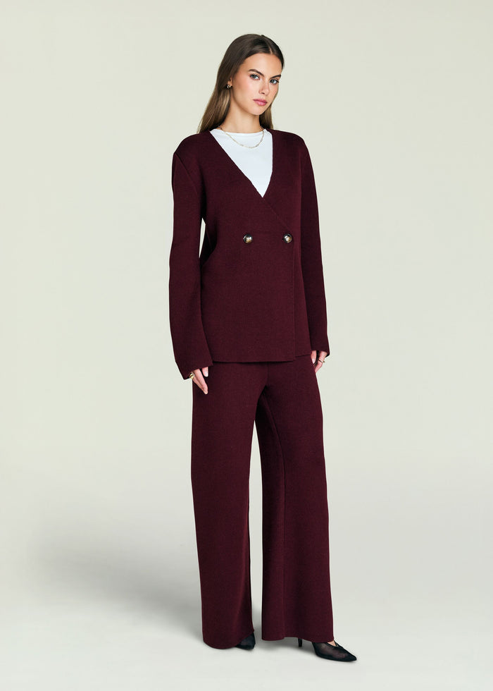 Tundra Sweater burgundy knit top worn with matching wide-leg pants on model.