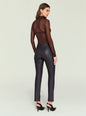 Back view of glossy black Cyra Leather Leggings on a model. thumbnail image 4 of 5