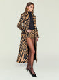 Side profile of a model in the zebra print Petal Coat belted at the waist over a black top. thumbnail image 3 of 5