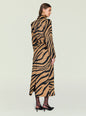 Back view of a model wearing the Petal Coat in camel tiger stripe with a waist belt thumbnail image 4 of 5