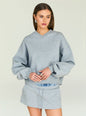 Model wearing a grey Taley Sweatshirt with a relaxed fit and ribbed cuffs thumbnail image 1 of 5