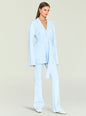Full body shot of a model in pale blue Katia Knit Pant set with wide leg pants and sneakers. thumbnail image 5 of 5