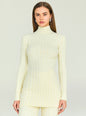 Cream ribbed knit tunic with a high neck on a model, showcasing a fitted silhouette. thumbnail image 1 of 5