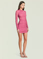 Pink ruched mesh mini dress with long sleeves worn by a model against a pale background thumbnail image 3 of 5
