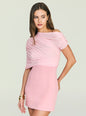 Model wearing the Selma Mini Crepe Dress in soft pink with a ruched off shoulder bodice and fitted silhouette thumbnail image 5 of 5