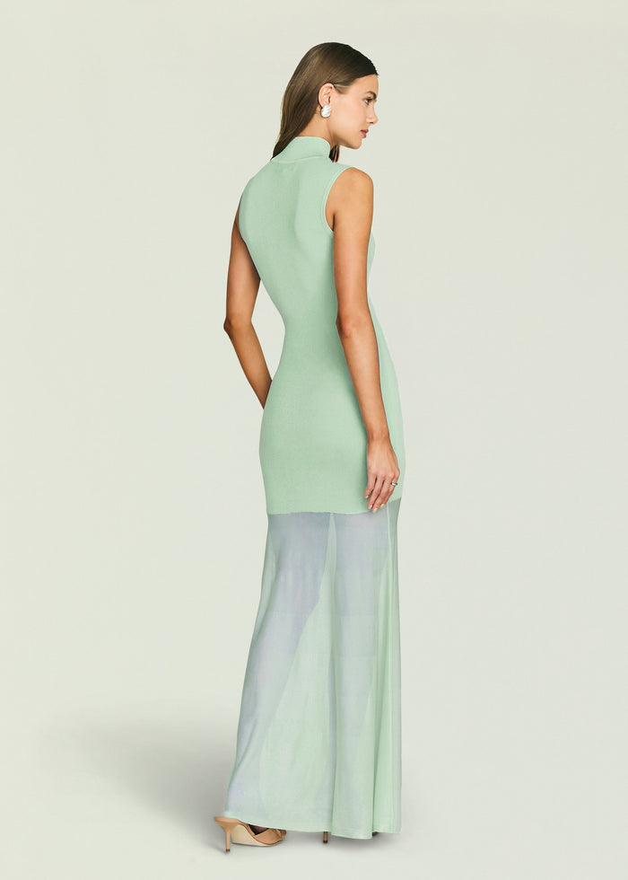 Back view of mint green Amine Knit Maxi Dress on a model with sleeveless high neck and fitted silhouette.