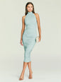 Esmee Midi Dress in pale mint with a high halter neck and ruched bodice model holding a beige clutch thumbnail image 1 of 5