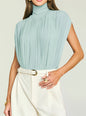 Giulia Bodysuit light blue pleated high neck top worn with a white belt and light trousers. thumbnail image 2 of 5