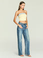 Model wearing a strapless pale yellow knit top with a denim blue trim at the top and jeans. thumbnail image 4 of 5