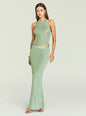 Mint green metallic knit halter top with a matching skirt worn by a model. thumbnail image 2 of 5
