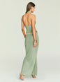 Harmony Metallic Knit Skirt back view on a model, halter top with open back and long matching skirt. thumbnail image 5 of 5