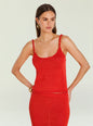 Model wearing bright red Aimee Knit Tank Top with thin straps against a pale backdrop. thumbnail image 1 of 5