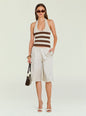 Front view of Amira Knit Tank halter neck striped knit top in beige and brown on a model wearing sunglasses. thumbnail image 6 of 6