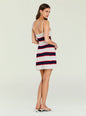 Back view of model in white knit mini dress with navy and red stripes and thin straps. thumbnail image 5 of 6