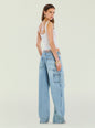 Model in white ribbed tank and light wash Bond Denim Pant shown from the back thumbnail image 4 of 5