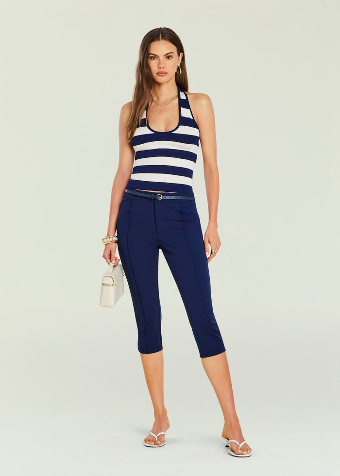 Model wearing Samra Capri Pant with navy cropped trousers belted, styled with a striped top.
