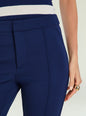 Close up of navy Samra Capri pant waist showing clean waistband and vertical seam thumbnail image 3 of 5