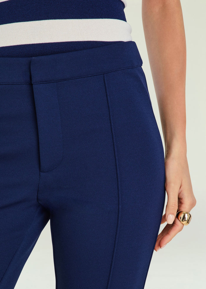 Close up of navy Samra Capri pant waist showing clean waistband and vertical seam