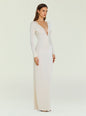 Full length Ivory Ebony Maxi Dress on a model with long sleeves and a deep V neckline wearing sandals thumbnail image 3 of 5