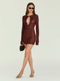 Bronze metallic knit mini dress with long sleeves and a front teardrop cutout worn by a model. thumbnail image 1 of 6