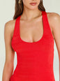 Close up of the red Emmeline Mini Dress neckline with gold hoop earrings and a delicate necklace. thumbnail image 2 of 5