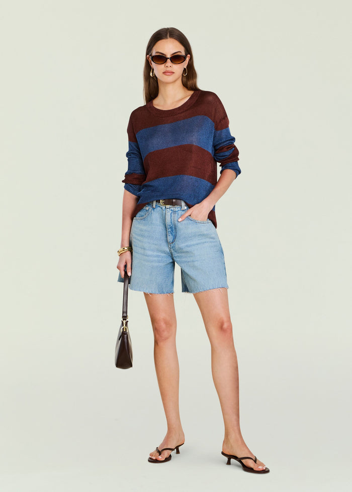 Hana Metallic Knit Top worn by a model in burgundy and navy stripes with light wash denim shorts.
