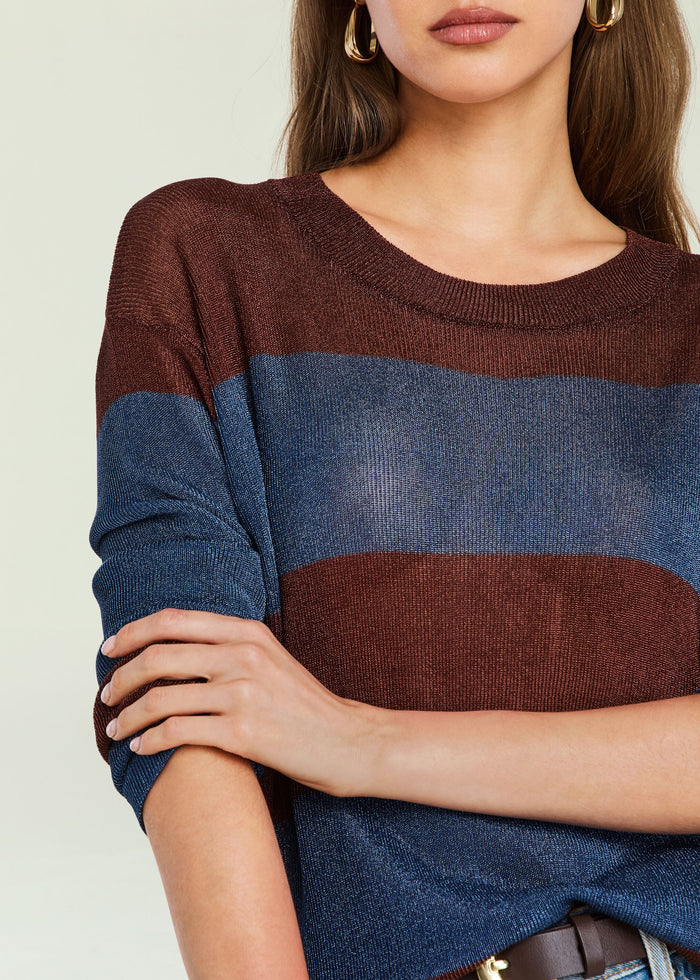 Hana Metallic Knit Top close up of burgundy metallic knit with a blue horizontal stripe