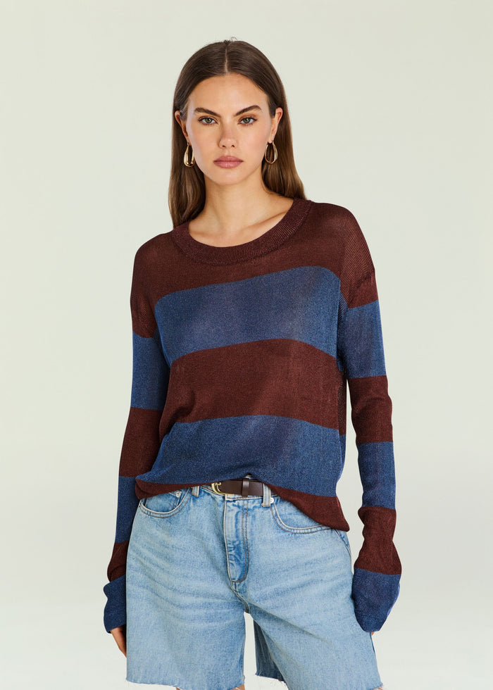 Front view of Hana Metallic Knit Top on a model with burgundy and blue stripes paired with light denim shorts.