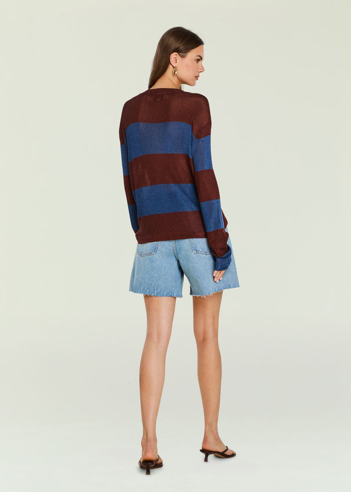 Back view of Hana Metallic Knit Top in burgundy and blue stripes worn with denim shorts
