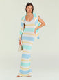 Model wearing a pastel striped Jasmine Knit Dress with a matching striped cardigan draped over her shoulders and sunglasses on her head thumbnail image 1 of 5
