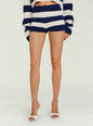 Close up of navy and white striped knit shorts with a thick waistband on a model thumbnail image 5 of 5