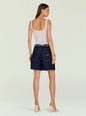 Back view of model in Sabrina Boyfriend Shorts with scarf belt and a white tank top, scarf tails visible at the waist. thumbnail image 6 of 6